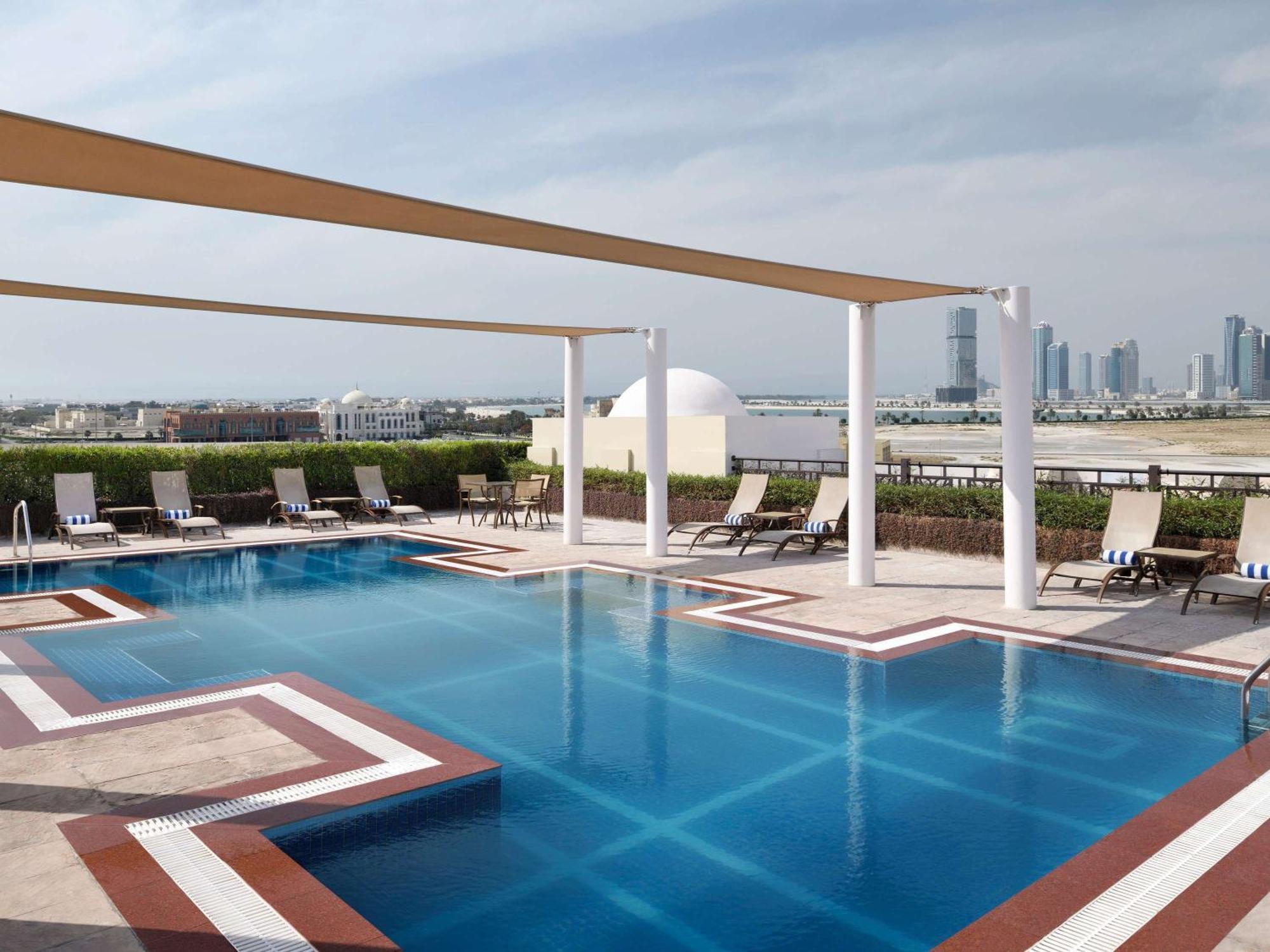 Movenpick Hotel Apartments Al Mamzar Dubai Exterior photo